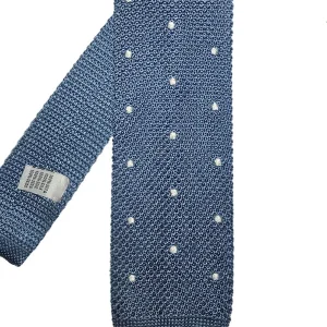 Corbata punto celeste topo blanco.