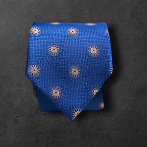 Corbata azul roseta dorada