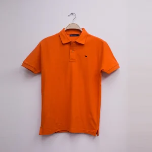Polo piqué liso manga corta naranja